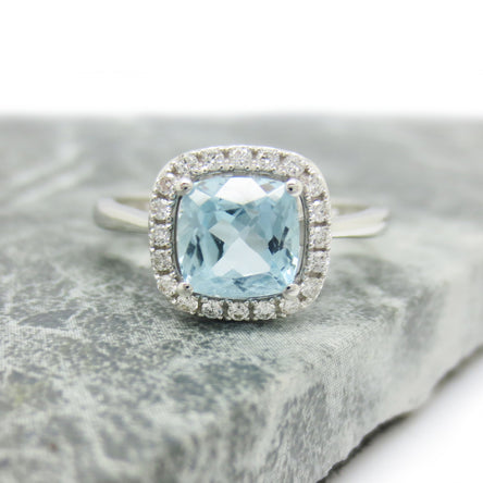 9ct White Gold Cushion-Cut Blue Topaz & Diamond Halo Engagement Ring